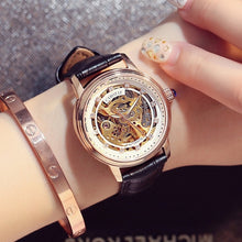 Load image into Gallery viewer, Carotif Personality Luxury Female Watch Fashion Round High-grade Diamond Female Watch Crystal Glass Mirror Trend Watch Woman